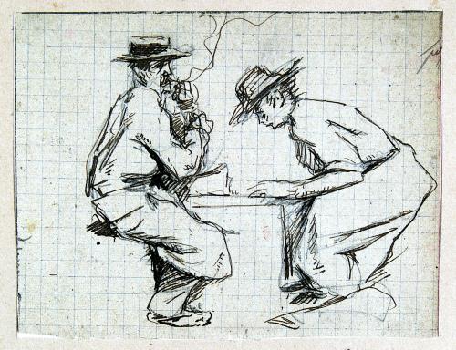 Due figure sedute ad un tavolo