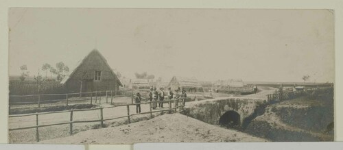 Contadini in un villaggio di capanne dell'Agro romano